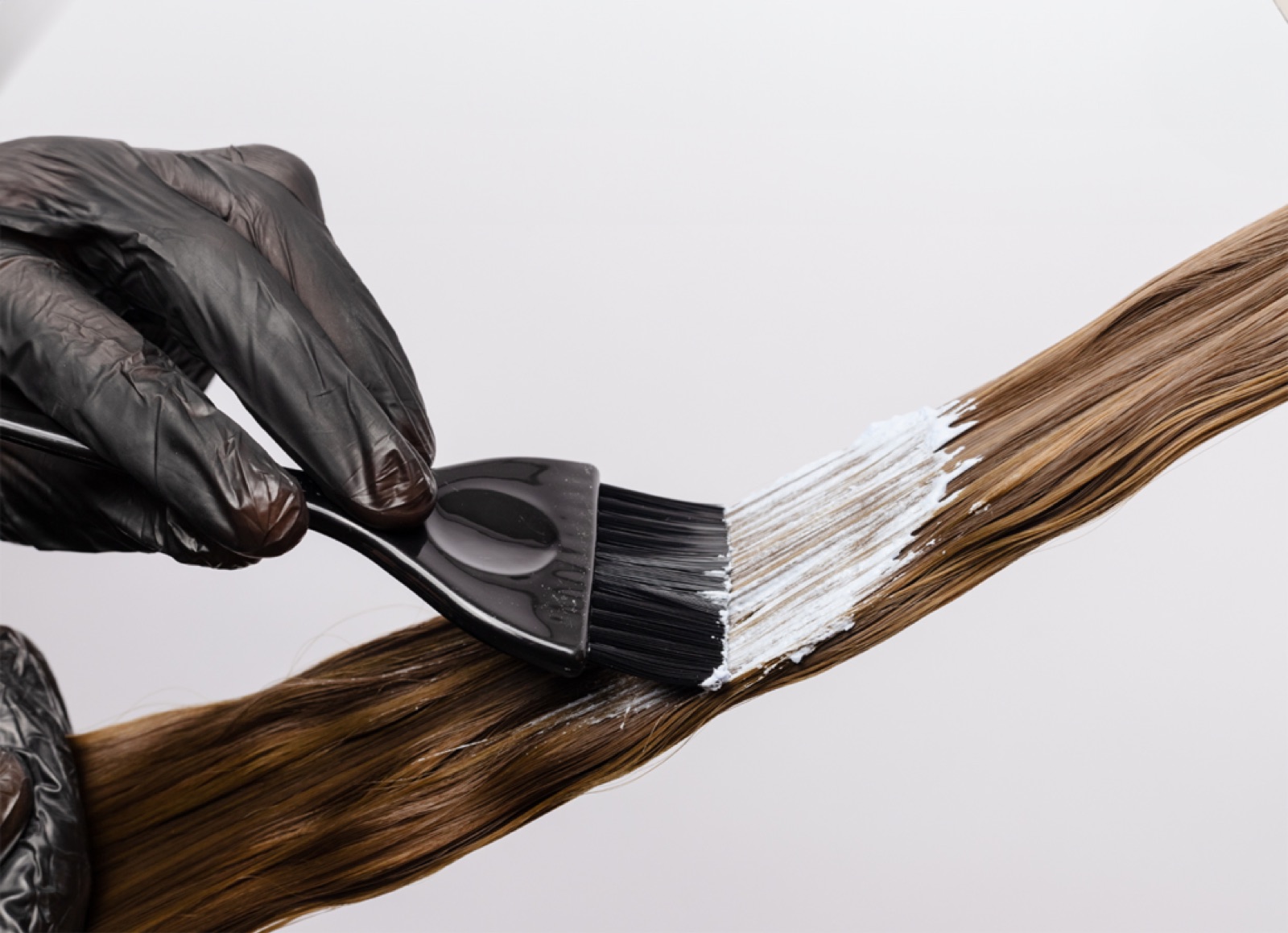 Balayage colour being hand-painted onto hair